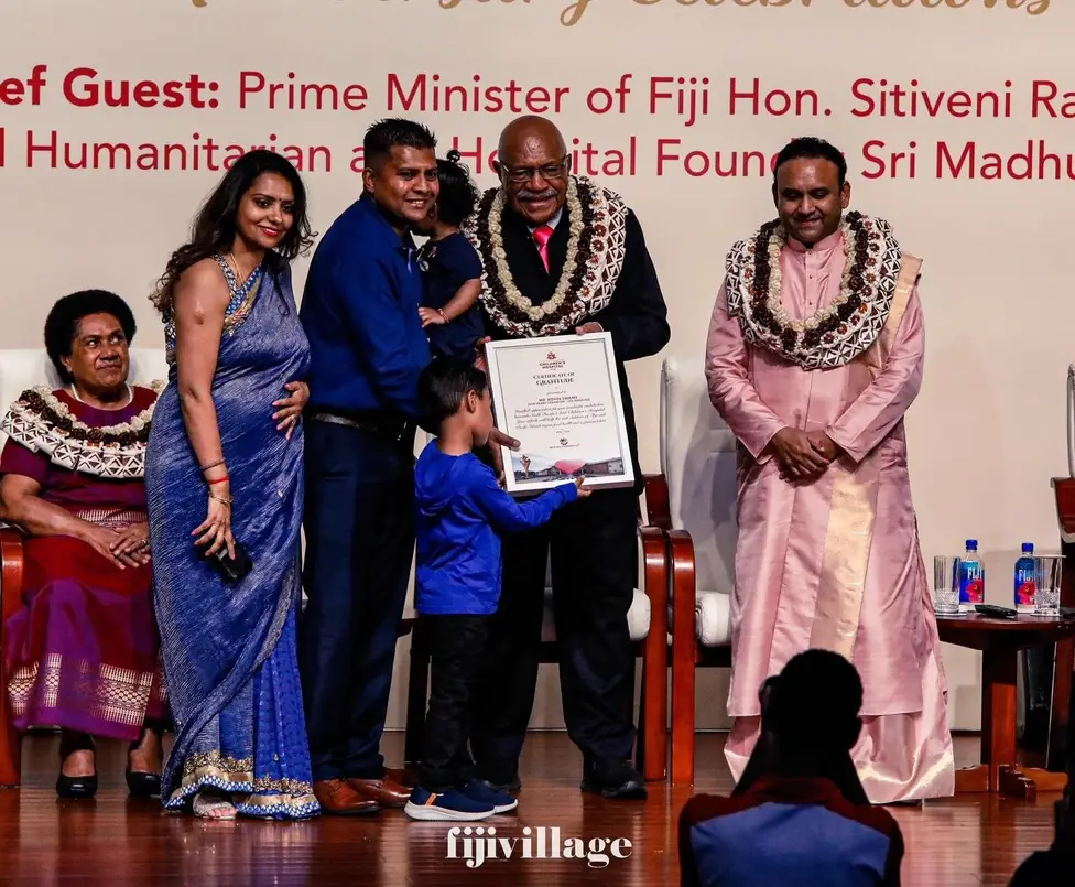 Divine Seva representatives receiving a certificate during the Children’s Hospital Fiji anniversary celebration